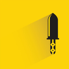 sword with shadow on yellow background