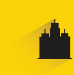 silhouette office building icon with shadow on yellow background