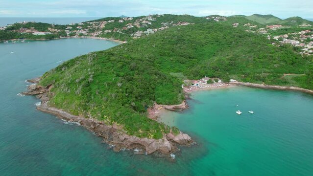 Aerial view circling gorgeous Azeda and Azedinha tropical island beaches, B&uacute;zios