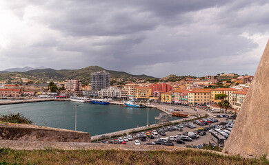 View to ferry port of Portoferraio with ferries docking for embarkation