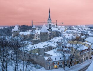 Snowy cityscape View of the Old Town of Tallinn, Estonia from Toompea Hill at sunset