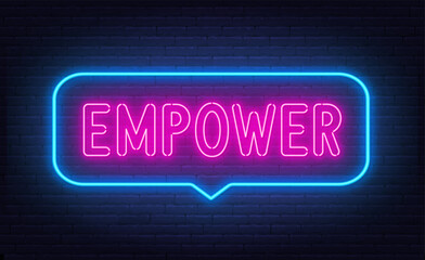 Empower neon sign in the speech bubble on brick wall background.