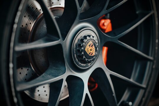 Closeup of a wheel of a Porsche 911 Carrera 4 GTS