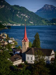 Beautiful shot of Saint Mary Church on the shore of Lake Lucerne in Weggis, Switzerland