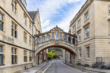 Fototapeta na wymiar The Bridge of Sighs or Hertford Bridge is between Hertford College university buildings in New College Lane street, in Oxford, Oxfordshire, England