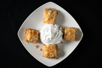 Baklava with whipped cream