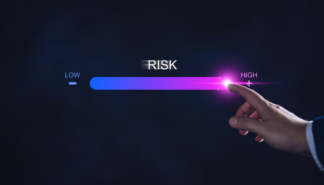 Risk management and chance to increase exposure for financial investment, projects, engineering, business. get maximum profit. Concept with manager's hand slide to high level. Fully open to risk.