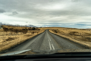 Front road view in Icelnad nature landscape with mountains