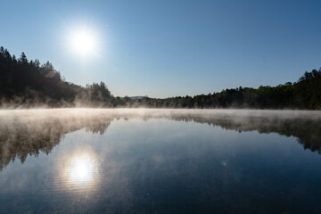 Fototapeta na wymiar Morning lake fog early spring weather 