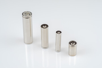 Alkaline batteries lie on white background, The concept of vital energy reserve