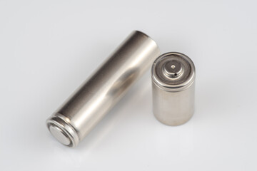 Alkaline batteries lie on white background, The concept of vital energy reserve