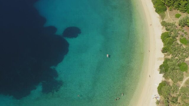 Aerial view of pebble Duba beach in Makarska riviera, the Adriatic Sea, Croatia