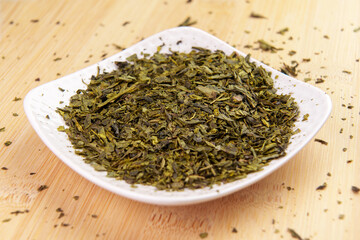 Fototapeta na wymiar High quality green dried sencha tea leaves