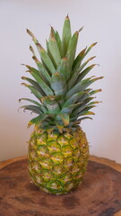 one fresh Pineapple fruit standing alone peacefully 