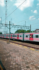 Obraz premium Roaming through a boundless sky, the train carries passengers on an adventure beyond the horizon.