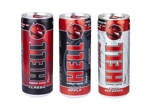 et aluminum cans of HELL classic, strong apple, strong red grape energy drink isolated on a transparent background
