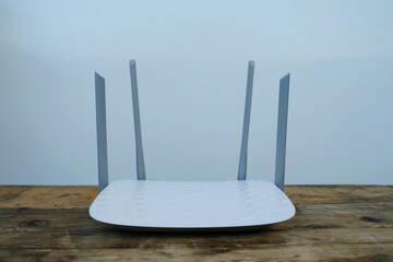 modern wireless Wi-Fi Router with four non-removable external antennas for better search and signal...