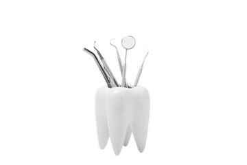 Dental instruments and tooth model isolated on white background. Professional tools for oral care. Whitens teeth, stimulates gums, removes plaque and tartar. Clean teeth.Dentistry concept. Collage. De