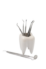 Dental instruments and tooth model isolated on white background. Professional tools for oral care. Whitens teeth, stimulates gums, removes plaque and tartar. Clean teeth.Dentistry concept. Collage. De