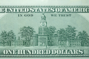 Picture of the building of Independence Hall with writings In God We Trust, printed on One hundred...