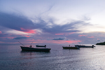 Wooden fishing boats at dawn at Success Beach, Montego Bay, Jamaica