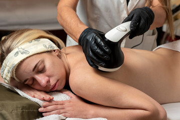 woman doing aesthetic treatment with body mesotherapy technique for beauty and health of the body