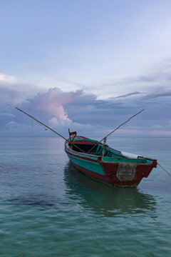 A wooden fishing boat at dawn at Success Beach, Montego Bay, Jamaica 