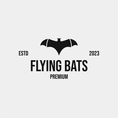 Creative flying bats logo design concept illustration idea