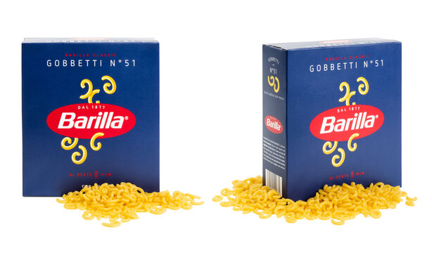 Munich, 05.22.2023: box of Italian Barilla brand "gobbetti"  pasta surrounded by the actual product / noodles isolated over transparency, two perspectives, cut-out food design element