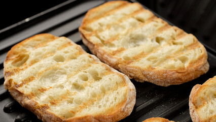Fresh ciabatta bread on grill