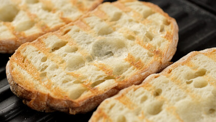 Fresh ciabatta bread on grill