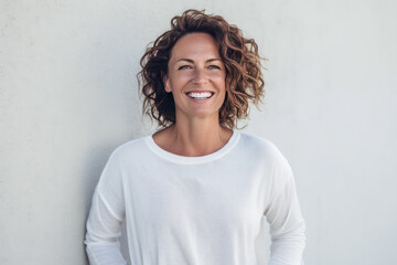 Smiling woman in white clothing on an isolated white outdoor background. Generative AI.