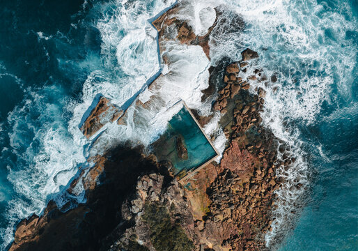 North Curl Curl rock pool with incoming waves.