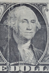 portrait of Washington on one United States dollar banknote