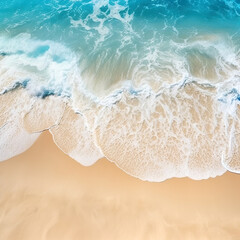 Fototapeta na wymiar Top view of sandy beach and soft blue ocean wave