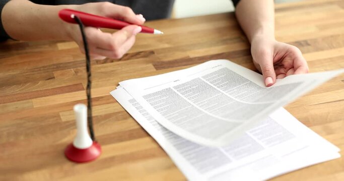 Bank client signing document with ballpoint pen on stand closeup 4k movie slow motion. Working with clients signing contracts concept 