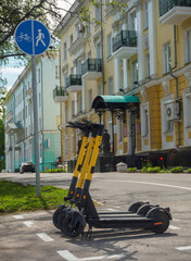 Green eco-friendly transport. Electric scooters in the parking lot at the bike path on Lenin Avenue, Cheboksary, Republic of Chuvashia, Russia, May 2023