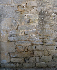 Old stone wall ideal for backgrounds and textures