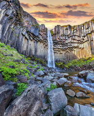 Breathtaking view of Svartifoss waterfall with basalt columns on South Iceland.