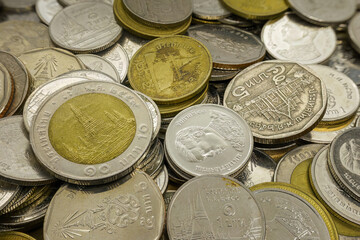 Pile of Thai coins macro close up.