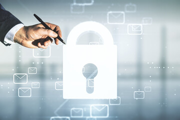 Man hand with pen working with abstract virtual lock illustration with postal envelopes on blurred office background, cyber security and email protection concept. Multiexposure