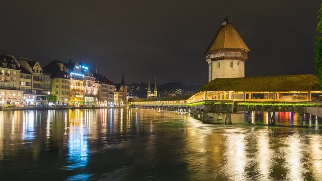 city skyline, night timelapse at Chapel Bridge, Lucerne (Luzern), Switzerland 4K Time lapse