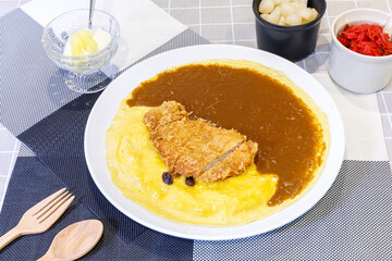 curry rice with tonkatsu fried pork cutlet and creamy omelet - Japanese food style
