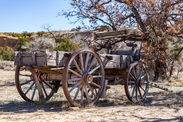 Fototapeta na wymiar Old horse carriage in a ghost town ranch in New Mexico