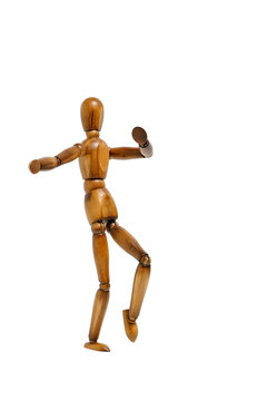 Wooden brown mannequin in motion.