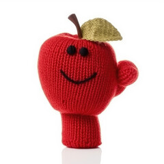 Handmade apple toy with funny face isolated on white background food puppet. Generative AI
