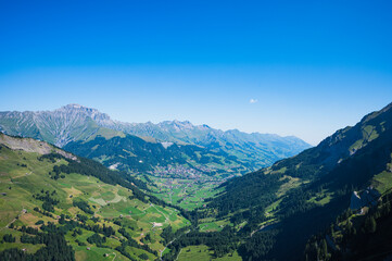 Bern, Switzerland - July 25, 2022 - View of Engstligenalp from the Engstligengrat hiking trail, Swiss Alps, Switzerland