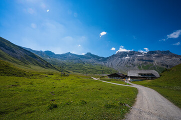 Bern, Switzerland - July 25, 2022 - View of Engstligenalp from the Engstligengrat hiking trail, Swiss Alps, Switzerland