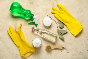 Composition with cleaning supplies on grunge background