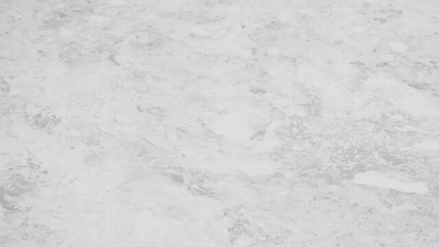 Chilled cookie dough scoops on the baking sheet to bake unicorn chocolate chip cookies.